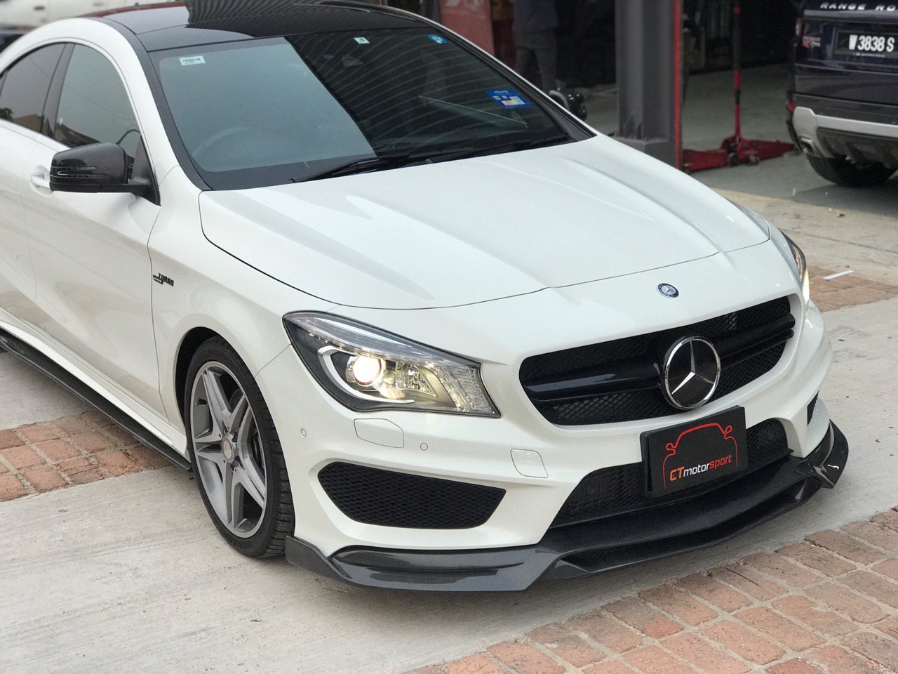 Mercedes W117 CLA CLA45 Installed Varis Style Carbon Fibre Front Lip 